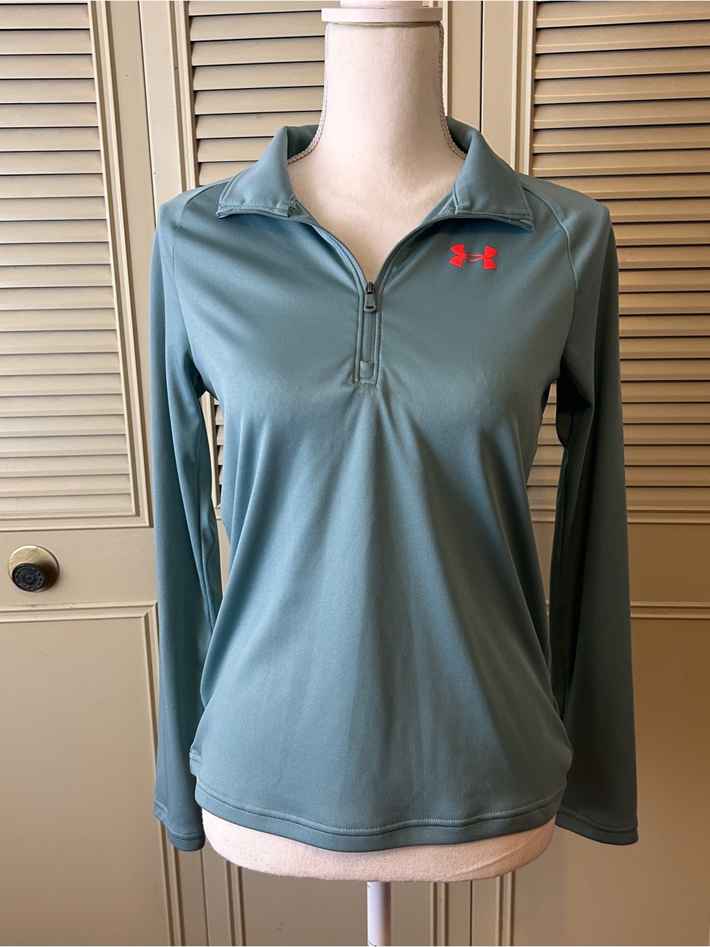 Under Armour Women’s Long-Sleeve Half-Zip in Seafoam with Coral Logo